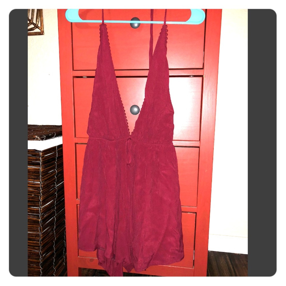 Red backless halter romper